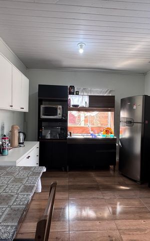 Casa à venda com 90m², 2 quartos e 2 vagas Casa à venda com 90m², 2 quartos e 2 vagasSala/Cozinha