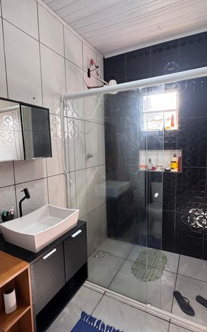 Casa à venda com 90m², 2 quartos e 2 vagas Casa à venda com 90m², 2 quartos e 2 vagasBanheiro