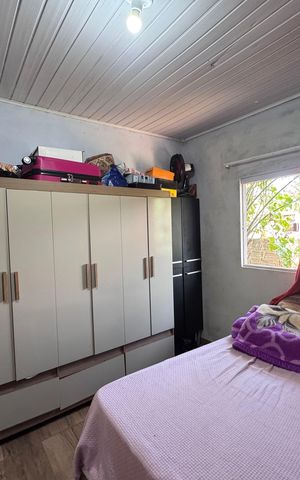Casa à venda com 90m², 2 quartos e 2 vagas Casa à venda com 90m², 2 quartos e 2 vagasQuarto 1