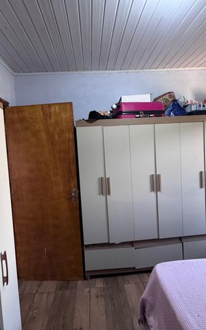 Casa à venda com 90m², 2 quartos e 2 vagas Casa à venda com 90m², 2 quartos e 2 vagasQuarto 1