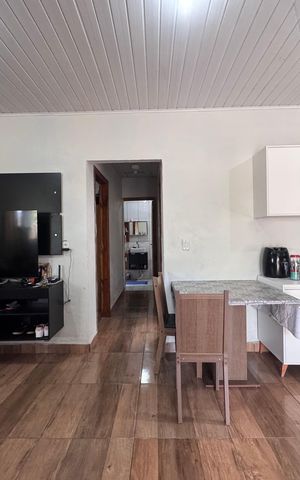 Casa à venda com 90m², 2 quartos e 2 vagas Casa à venda com 90m², 2 quartos e 2 vagasSala/Cozinha