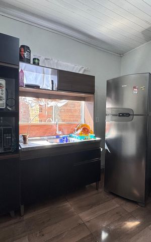 Casa à venda com 90m², 2 quartos e 2 vagas Casa à venda com 90m², 2 quartos e 2 vagasSala/Cozinha