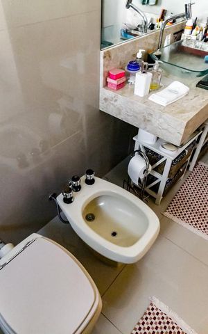 Casa à venda com 410m², 4 quartos e 4 vagas Casa à venda com 410m², 4 quartos e 4 vagasBanheiro da Suíte 1