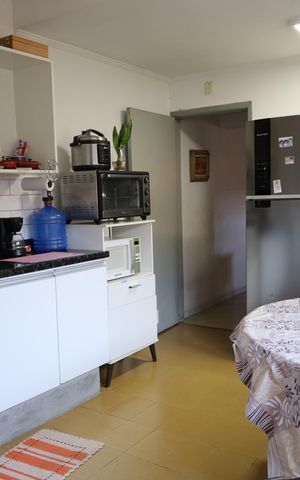 Casa à venda com 140m², 2 quartos e 2 vagasCozinha