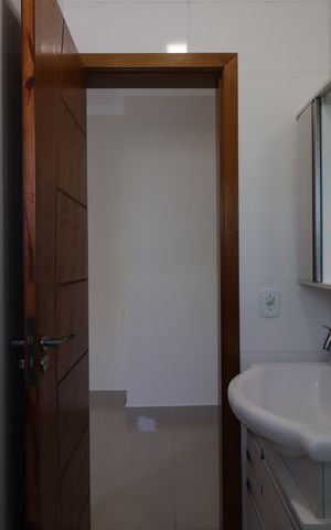 Casa à venda com 104m², 2 quartos e 3 vagasBanheiro da Suíte 2