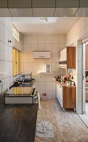 Casa à venda com 115m², 3 quartos e 1 vaga Casa à venda com 115m², 3 quartos e 1 vagaCozinha
