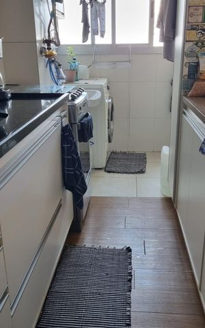 Apartamento à venda com 50m², 2 quartos e 1 vaga Apartamento à venda com 50m², 2 quartos e 1 vagaCozinha e Área de Serviço
