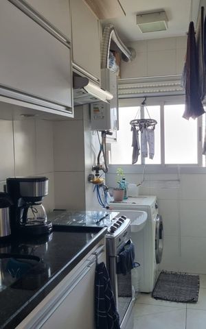 Apartamento à venda com 50m², 2 quartos e 1 vaga Apartamento à venda com 50m², 2 quartos e 1 vagaCozinha e Área de Serviço