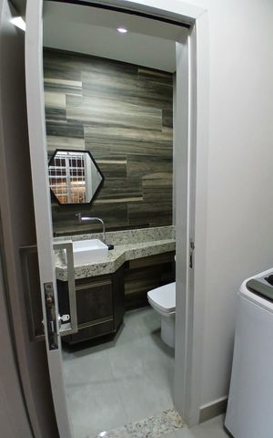 Casa à venda com 130m², 3 quartos e 3 vagas Casa à venda com 130m², 3 quartos e 3 vagasBanheiro 2
