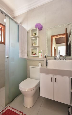 Casa de condomínio à venda com 280m², 3 quartos e 4 vagasBanheiro Social