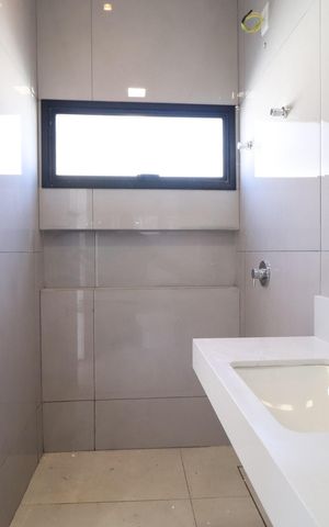 Casa de condomínio para alugar com 182m², 3 quartos e 3 vagasBanheiro da Suíte 2