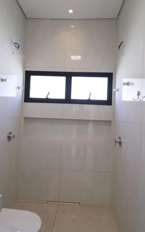 Casa de condomínio para alugar com 182m², 3 quartos e 3 vagasBanheiro da Suíte 3