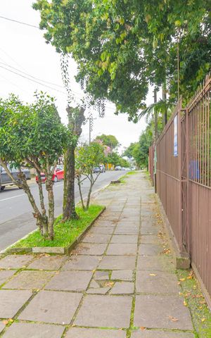 Casa à venda com 254m², 4 quartos e 5 vagas Casa à venda com 254m², 4 quartos e 5 vagasFachada