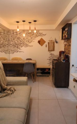 Apartamento à venda com 48m², 2 quartos e 2 vagasSala
