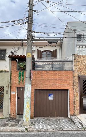 Casa à venda com 138m², 3 quartos e 1 vagaFachada + plaquinha