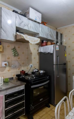 Casa à venda com 133m², 2 quartos e 2 vagas Casa à venda com 133m², 2 quartos e 2 vagasCozinha