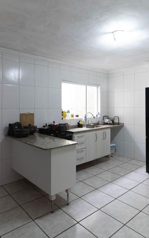 Casa à venda com 130m², 2 quartos e 3 vagas Casa à venda com 130m², 2 quartos e 3 vagasCozinha