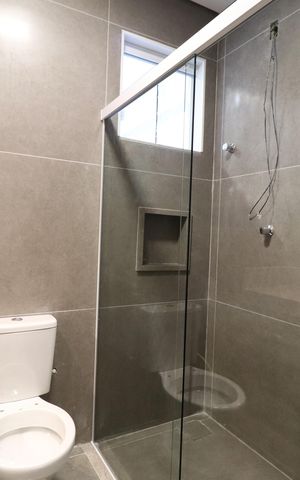 Casa de condomínio para alugar com 120m², 3 quartos e 2 vagasBanheiro da Suíte 3