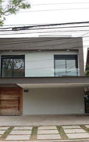 Casa de condomínio para alugar com 484m², 4 quartos e 3 vagasFachada