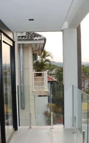 Casa de condomínio para alugar com 484m², 4 quartos e 3 vagasVaranda da Suíte 1