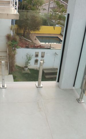 Casa de condomínio para alugar com 484m², 4 quartos e 3 vagasVaranda da Suíte 1