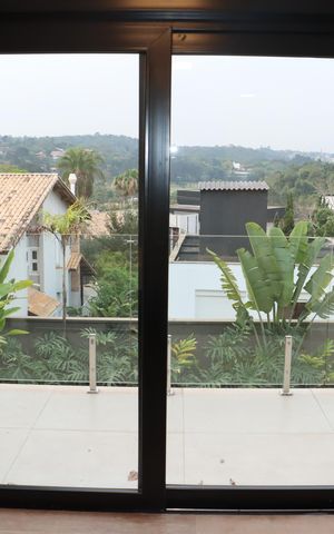 Casa de condomínio para alugar com 484m², 4 quartos e 3 vagasVista da Suíte 4