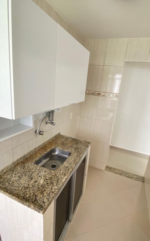 Apartamento à venda com 48m², 2 quartos e 1 vaga Apartamento à venda com 48m², 2 quartos e 1 vagaCozinha e Área de Serviço