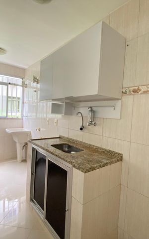 Apartamento à venda com 48m², 2 quartos e 1 vaga Apartamento à venda com 48m², 2 quartos e 1 vagaCozinha e Área de Serviço