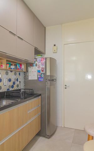 Apartamento à venda com 64m², 2 quartos e 1 vaga Apartamento à venda com 64m², 2 quartos e 1 vagaCozinha e Área de Serviço
