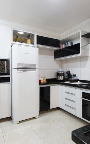 Casa de condomínio à venda com 120m², 3 quartos e 2 vagas Casa de condomínio à venda com 120m², 3 quartos e 2 vagasCozinha - Armários