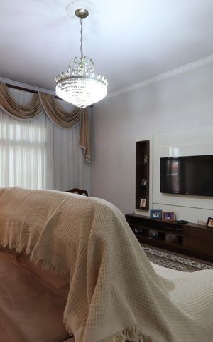 Casa à venda com 338m², 3 quartos e 8 vagasSala