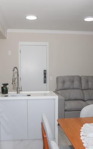 Apartamento à venda com 41m², 2 quartos e 1 vaga Apartamento à venda com 41m², 2 quartos e 1 vagaCozinha e Sacada