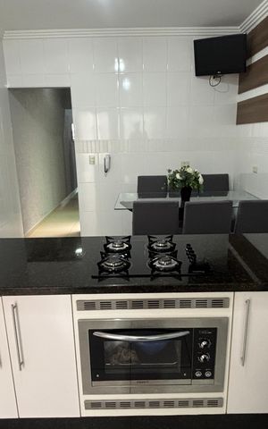 Casa à venda com 134m², 3 quartos e 2 vagas Casa à venda com 134m², 3 quartos e 2 vagasCozinha