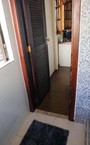 Casa à venda com 219m², 4 quartos e 2 vagasBanheiro da Suíte 4