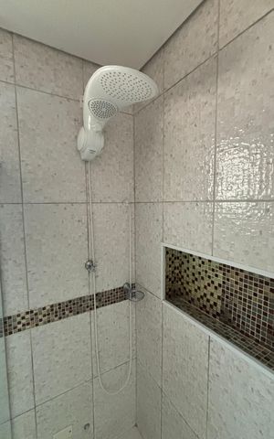 Casa à venda com 300m², 4 quartos e 5 vagasBanheiro da Suíte 1