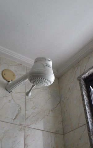 Casa de condomínio à venda com 172m², 3 quartos e 2 vagasBanheiro da Suíte 1