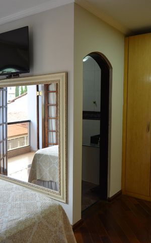 Casa à venda com 390m², 4 quartos e 6 vagasSuíte 1