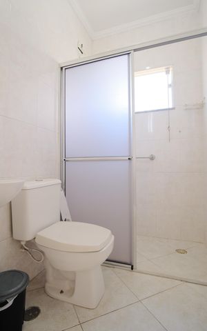 Casa à venda com 216m², 3 quartos e 5 vagasBanheiro da Suíte 1