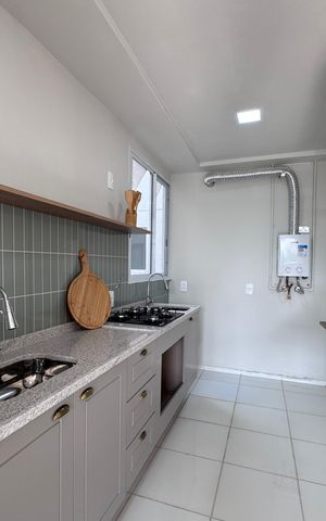 Apartamento à venda com 43m², 2 quartos e 1 vaga Apartamento à venda com 43m², 2 quartos e 1 vagaCozinha e Área de Serviço