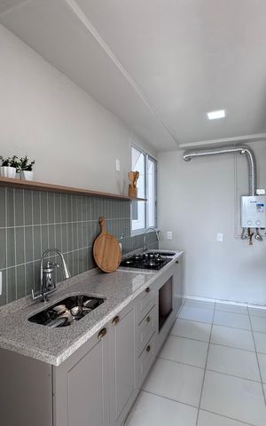 Apartamento à venda com 43m², 2 quartos e 1 vaga Apartamento à venda com 43m², 2 quartos e 1 vagaCozinha e Área de Serviço