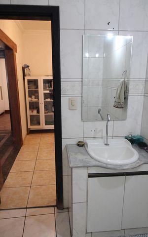 Casa à venda com 420m², 3 quartos e 3 vagasBanheiro