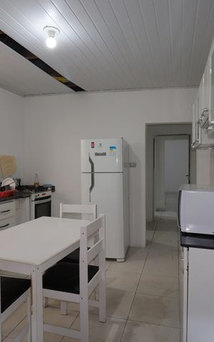 Casa à venda com 100m², 2 quartos e 1 vagaCasa 1 - Cozinha