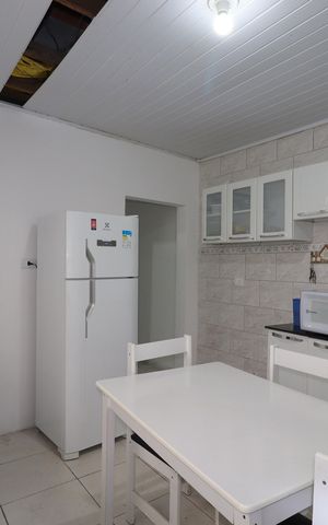 Casa à venda com 100m², 2 quartos e 1 vagaCasa 1 - Cozinha