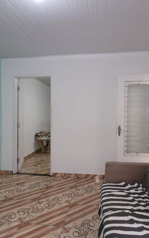 Casa à venda com 100m², 2 quartos e 1 vagaCasa 1 - Sala