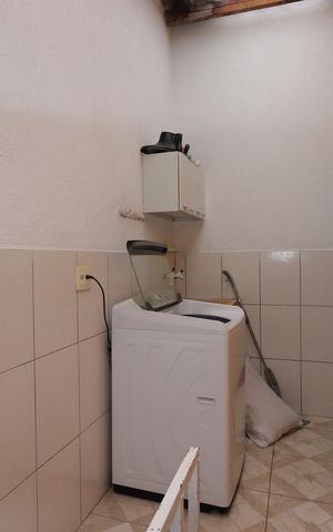 Casa à venda com 100m², 2 quartos e 1 vagaCasa 2 - Área de Serviço