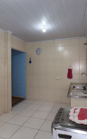 Casa à venda com 100m², 2 quartos e 1 vagaCasa 2 - Sala/Cozinha