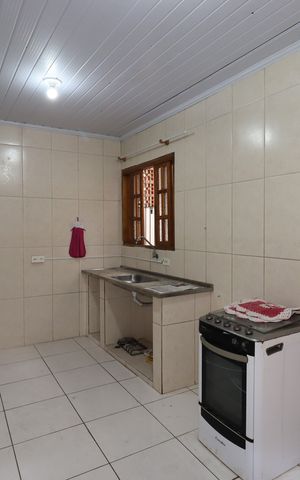 Casa à venda com 100m², 2 quartos e 1 vagaCasa 2 - Sala/Cozinha