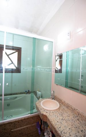 Casa à venda com 150m², 3 quartos e 3 vagas Casa à venda com 150m², 3 quartos e 3 vagasBanheiro da Suíte