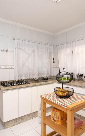 Casa à venda com 150m², 3 quartos e 3 vagas Casa à venda com 150m², 3 quartos e 3 vagasCozinha