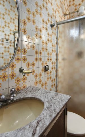 Casa à venda com 199m², 3 quartos e 3 vagasBanheiro Social